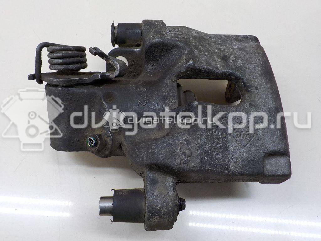 Фото Суппорт тормозной задний правый  440010014R для Renault Laguna {forloop.counter}}