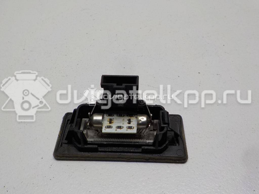 Фото Фонарь подсветки номера  8T0943021 для Skoda Fabia / Superb / Yeti 5L {forloop.counter}}