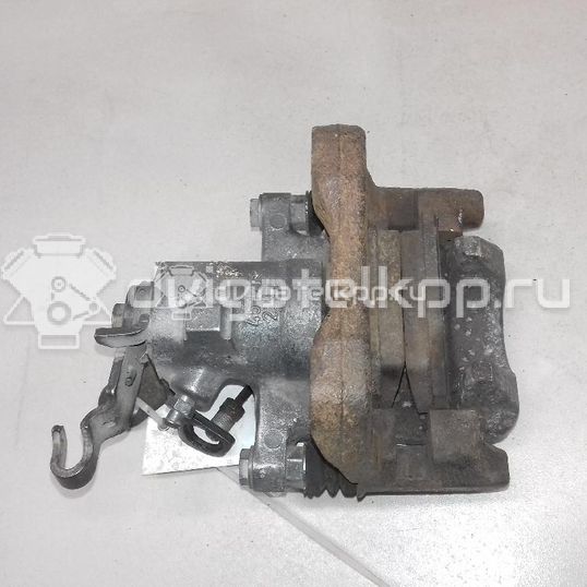 Фото Суппорт тормозной задний левый  1K0615423J для Skoda Roomster 5J / Octaviaii 1Z3 / Yeti 5L / Fabia / Octavia