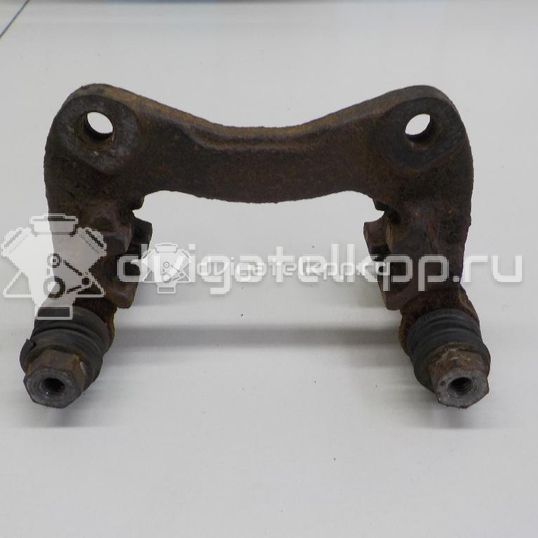 Фото Скоба суппорта заднего  443615425B для Volkswagen Passat / Scirocco / Golf