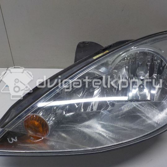 Фото Фара левая  1343657 для Ford Focus