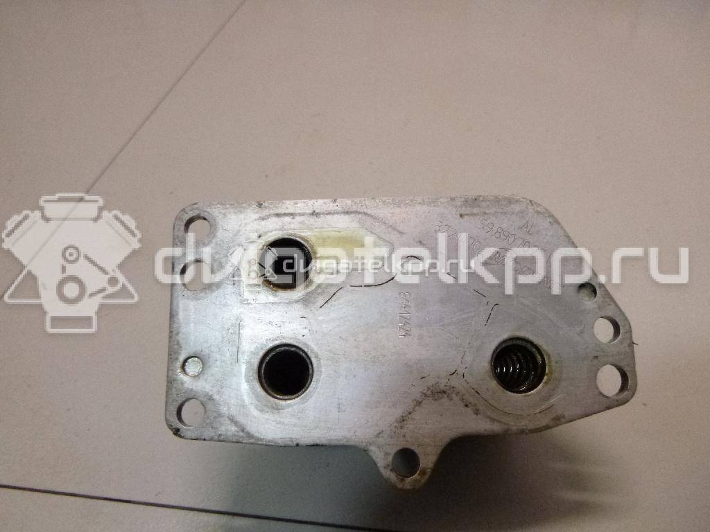 Фото Радиатор масляный для двигателя RFJ (EW10A) для Peugeot / Citroen / Peugeot (Df-Psa) 147 л.с 16V 2.0 л бензин 5989070251 {forloop.counter}}