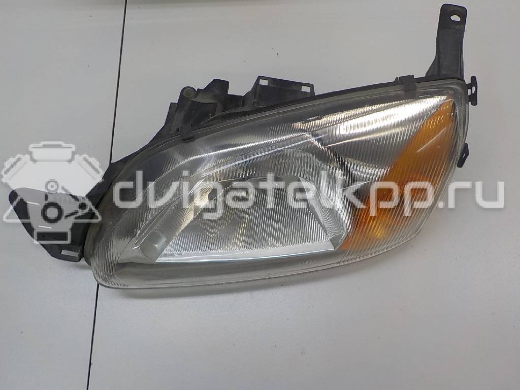 Фото Фара левая  1127897 для Ford Fiesta {forloop.counter}}