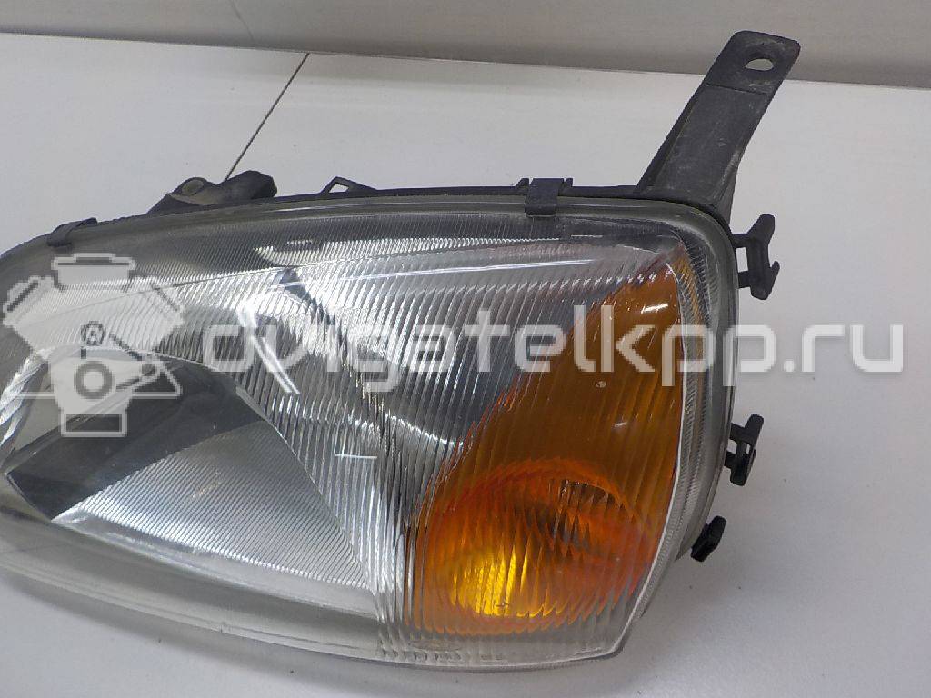 Фото Фара левая  1127897 для Ford Fiesta {forloop.counter}}