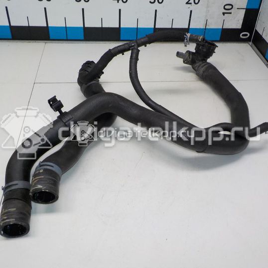 Фото Патрубок радиатора  5Q0121049AD для Volkswagen Golf