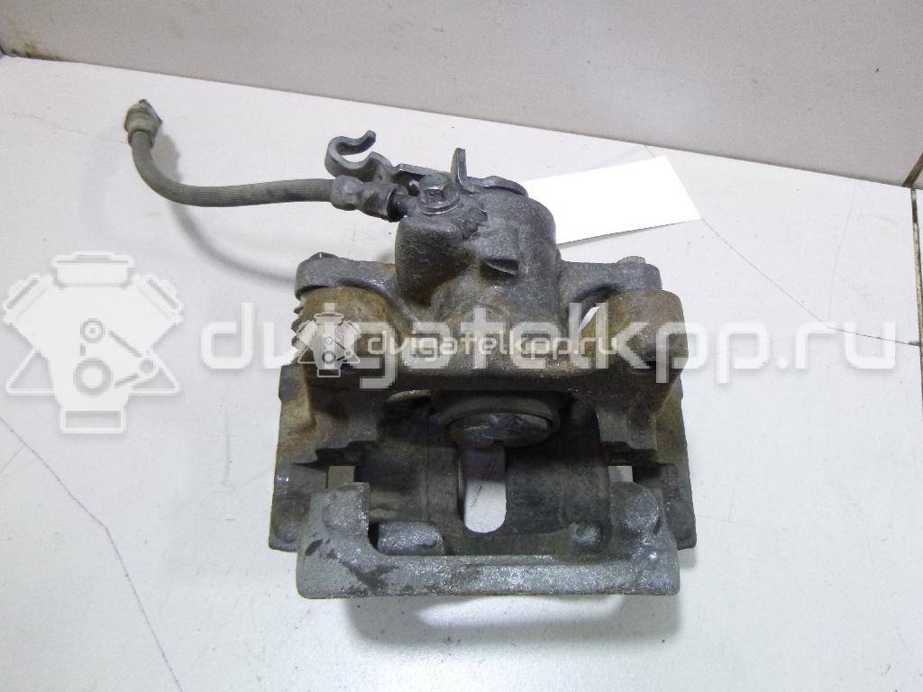 Фото Суппорт тормозной задний левый  5Q0615423B для vw Golf VII {forloop.counter}}