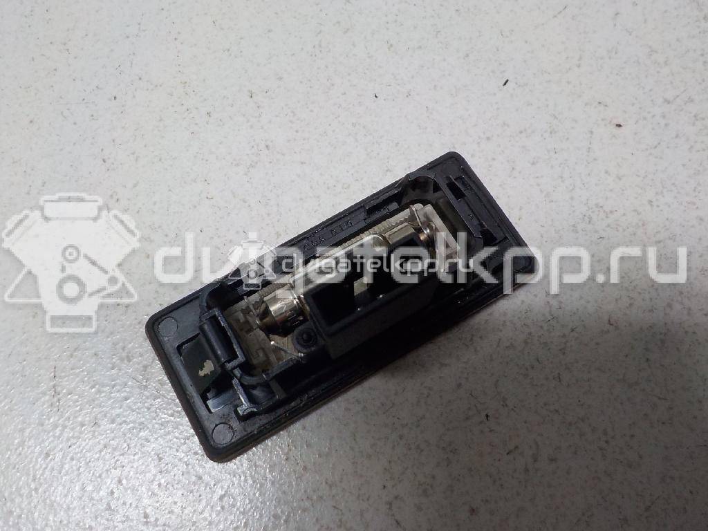 Фото Фонарь подсветки номера  8T0943021 для vw Passat [B6] {forloop.counter}}