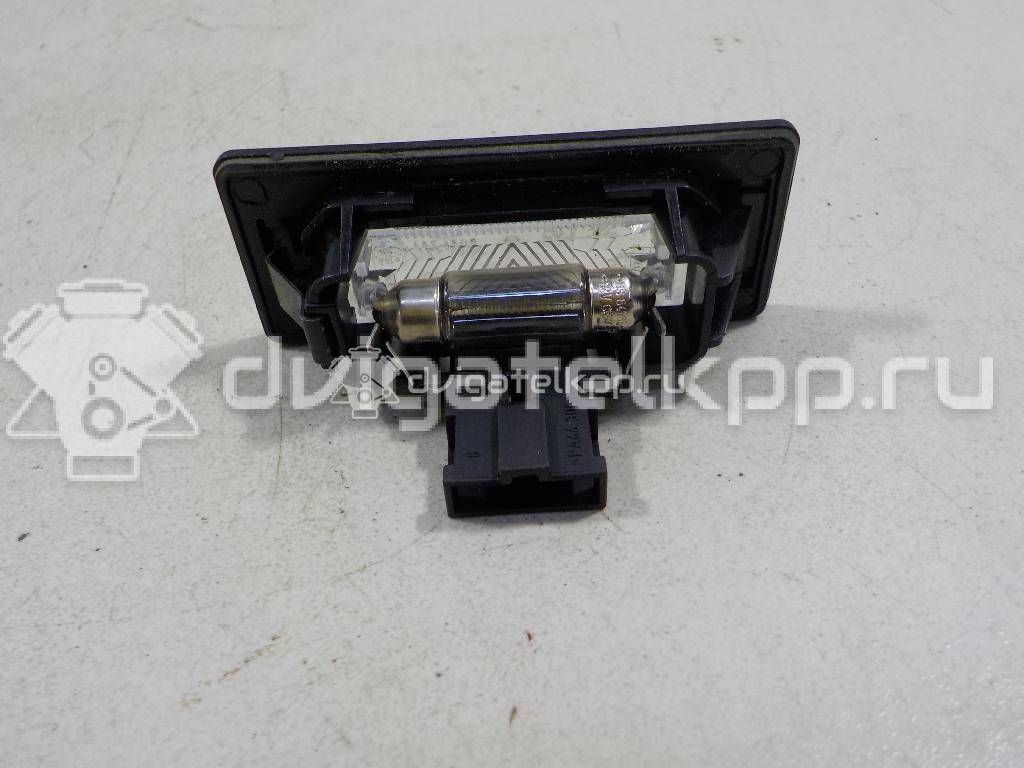 Фото Фонарь подсветки номера  8T0943021 для vw Passat [B6] {forloop.counter}}