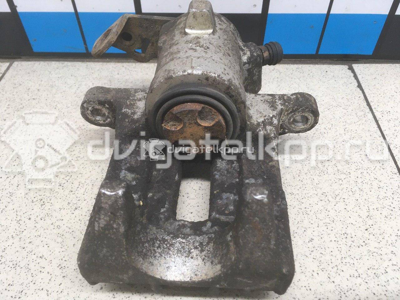 Фото Суппорт тормозной задний левый  6Q0615423A для Volkswagen Polo {forloop.counter}}