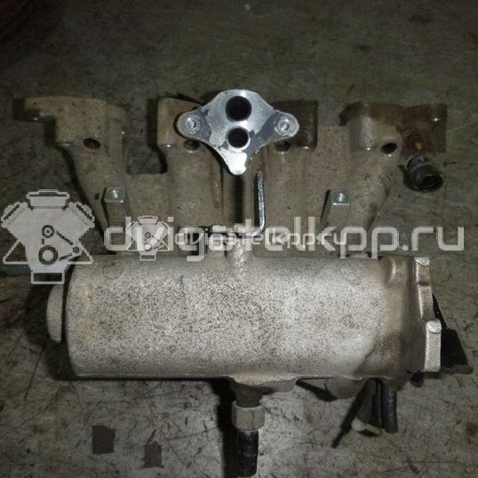 Фото Коллектор впускной для двигателя A15SMS для Daewoo / Chevrolet 86 л.с 8V 1.5 л бензин