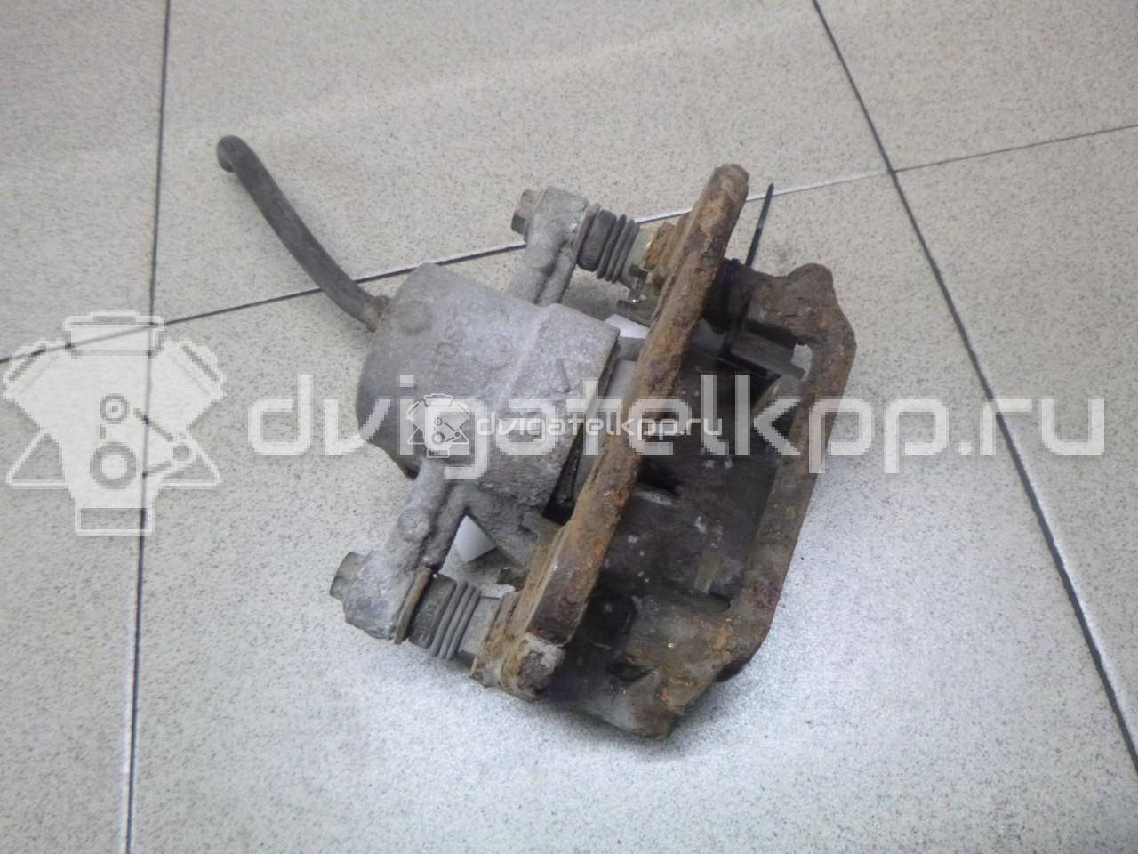 Фото Суппорт тормозной задний левый  4775005071 для Toyota Corolla / Avensis {forloop.counter}}