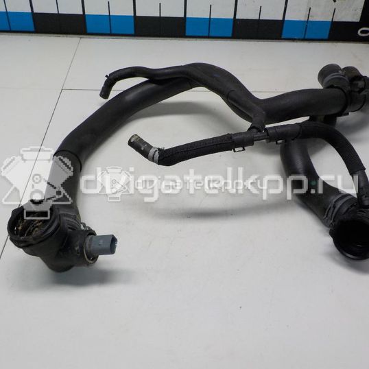 Фото Патрубок радиатора  5Q0121049AD для audi Q2