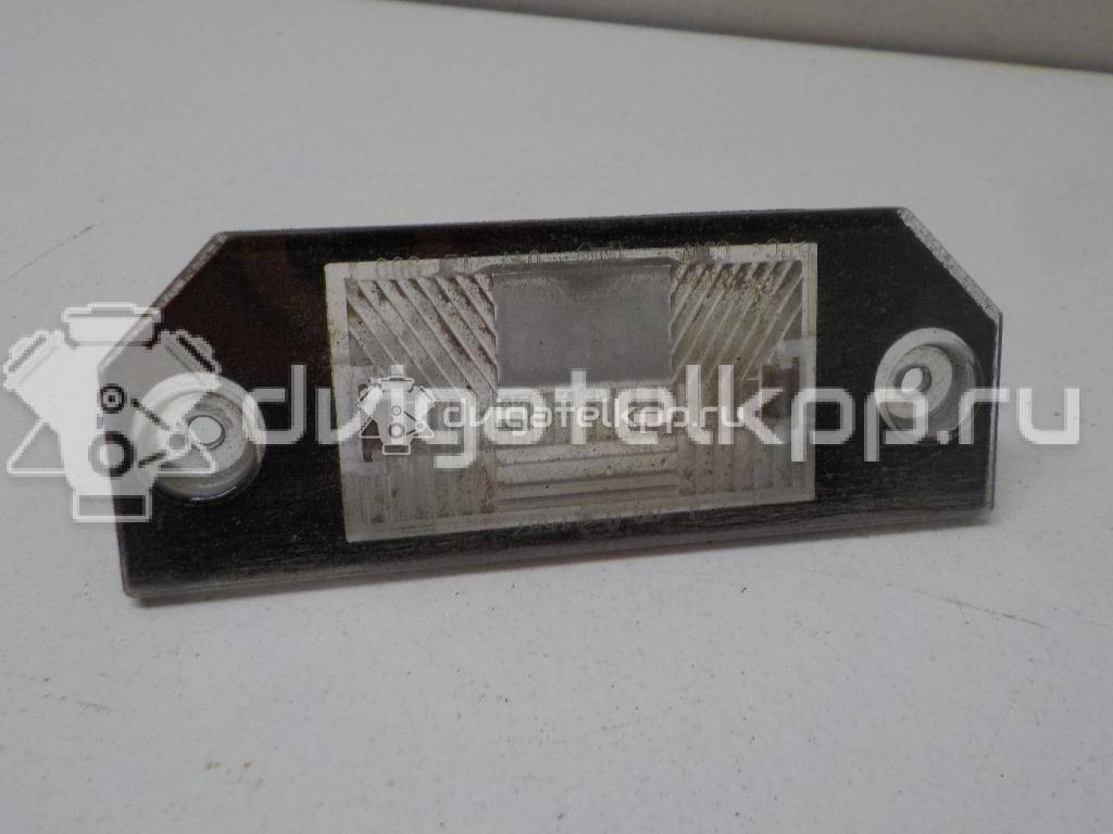 Фото Фонарь подсветки номера  4502331 для Ford Focus / C-Max {forloop.counter}}