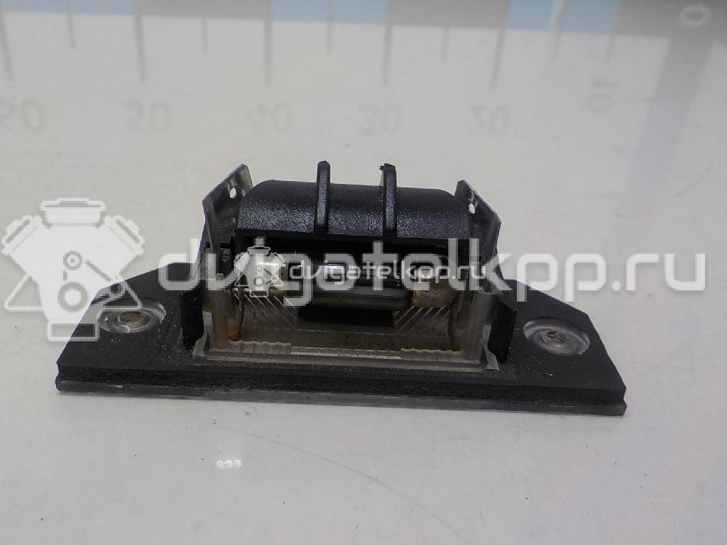 Фото Фонарь подсветки номера  4502331 для Ford Focus / C-Max {forloop.counter}}