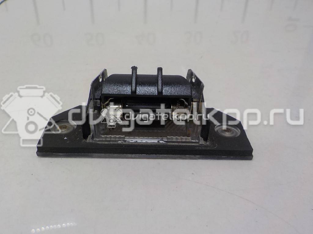 Фото Фонарь подсветки номера  4502331 для Ford Focus / C-Max {forloop.counter}}