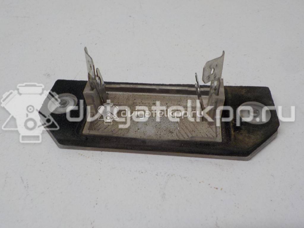 Фото Фонарь подсветки номера  4502331 для Ford Focus / C-Max {forloop.counter}}