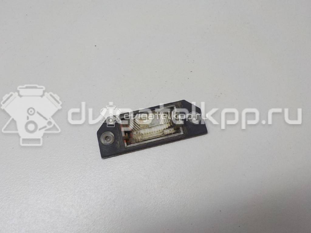 Фото Фонарь подсветки номера  4502331 для Ford Focus / C-Max {forloop.counter}}