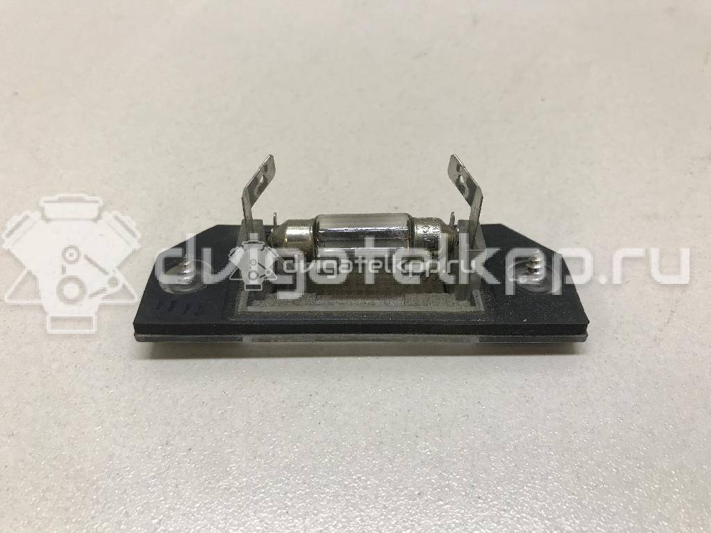 Фото Фонарь подсветки номера  3M5A13550AA для Ford Focus / C-Max {forloop.counter}}