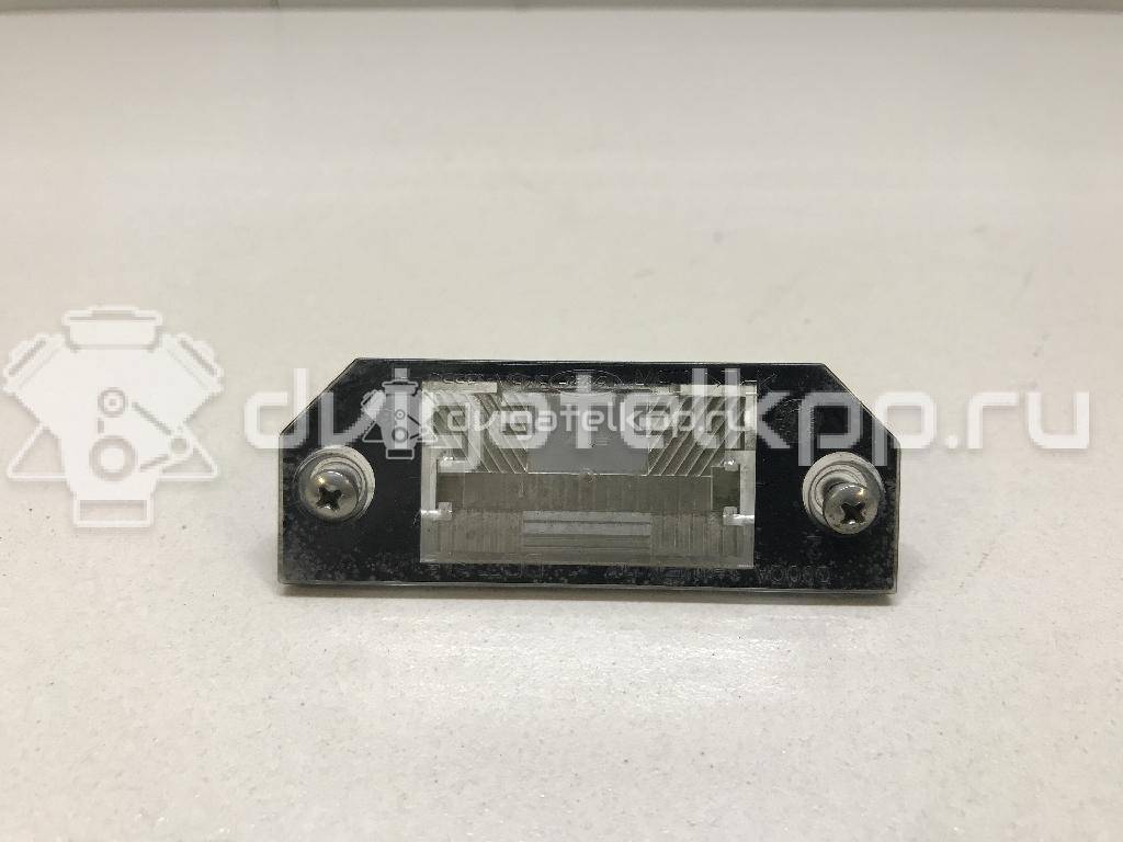 Фото Фонарь подсветки номера  3M5A13550AA для Ford Focus / C-Max {forloop.counter}}