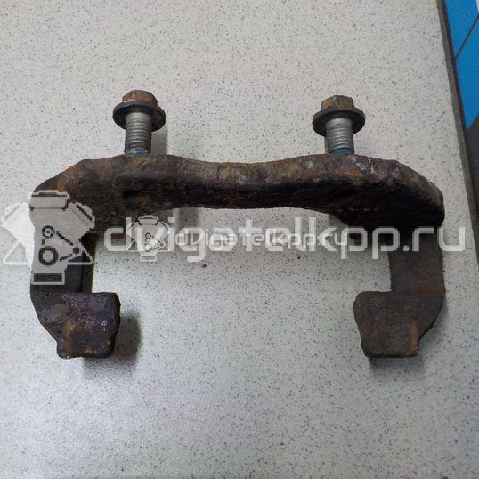 Фото Скоба суппорта переднего  1471710 для Ford Focus / C-Max