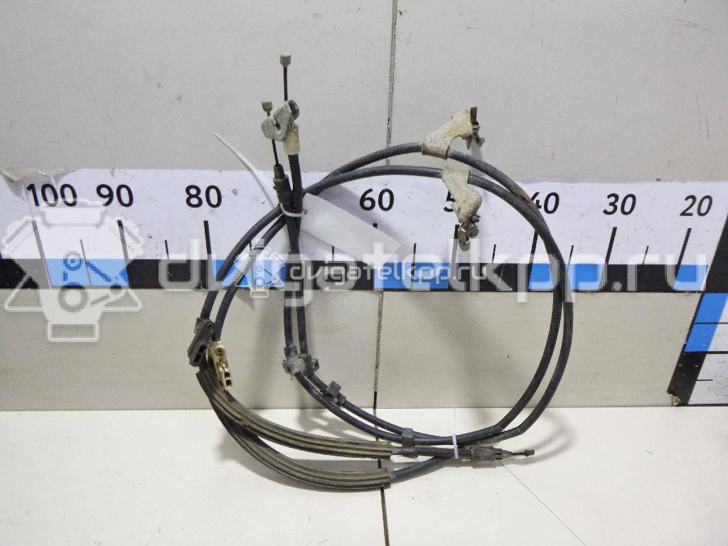 Фото Трос стояночного тормоза  2074151 для Ford Focus / C-Max {forloop.counter}}