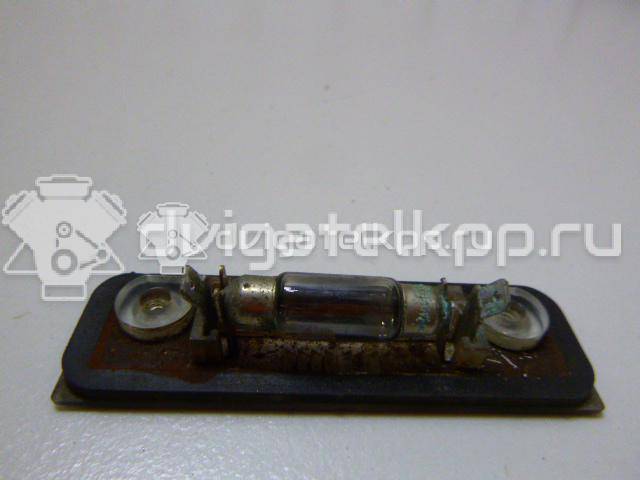 Фото Фонарь подсветки номера  1332916 для Ford Fiesta / Mondeo / Fusion Ju {forloop.counter}}