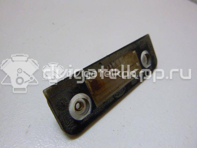 Фото Фонарь подсветки номера  1332916 для Ford Fiesta / Mondeo / Fusion Ju {forloop.counter}}