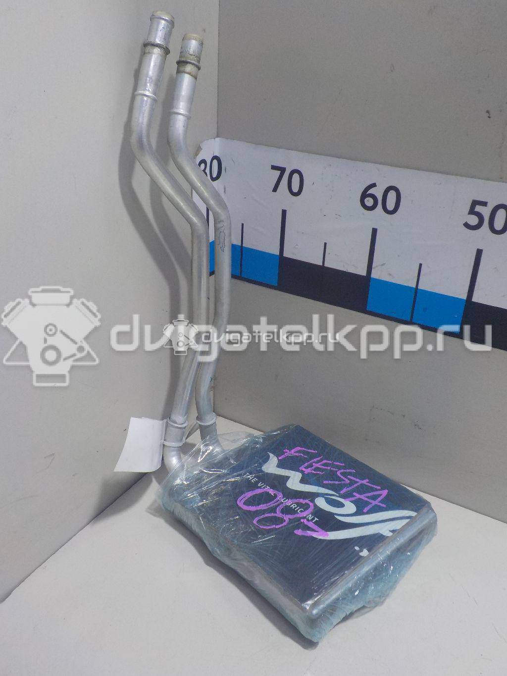 Фото Радиатор отопителя  1743436 для Ford Fiesta {forloop.counter}}