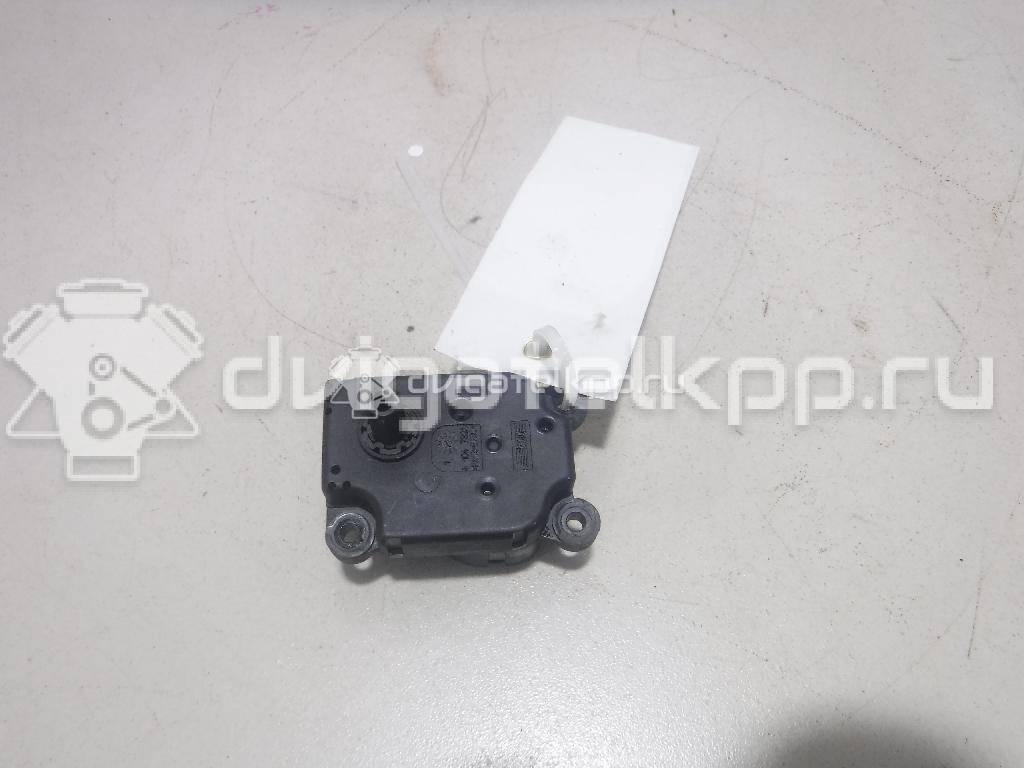 Фото Моторчик заслонки отопителя  1S7H19E616AA для Ford Focus / Mondeo {forloop.counter}}