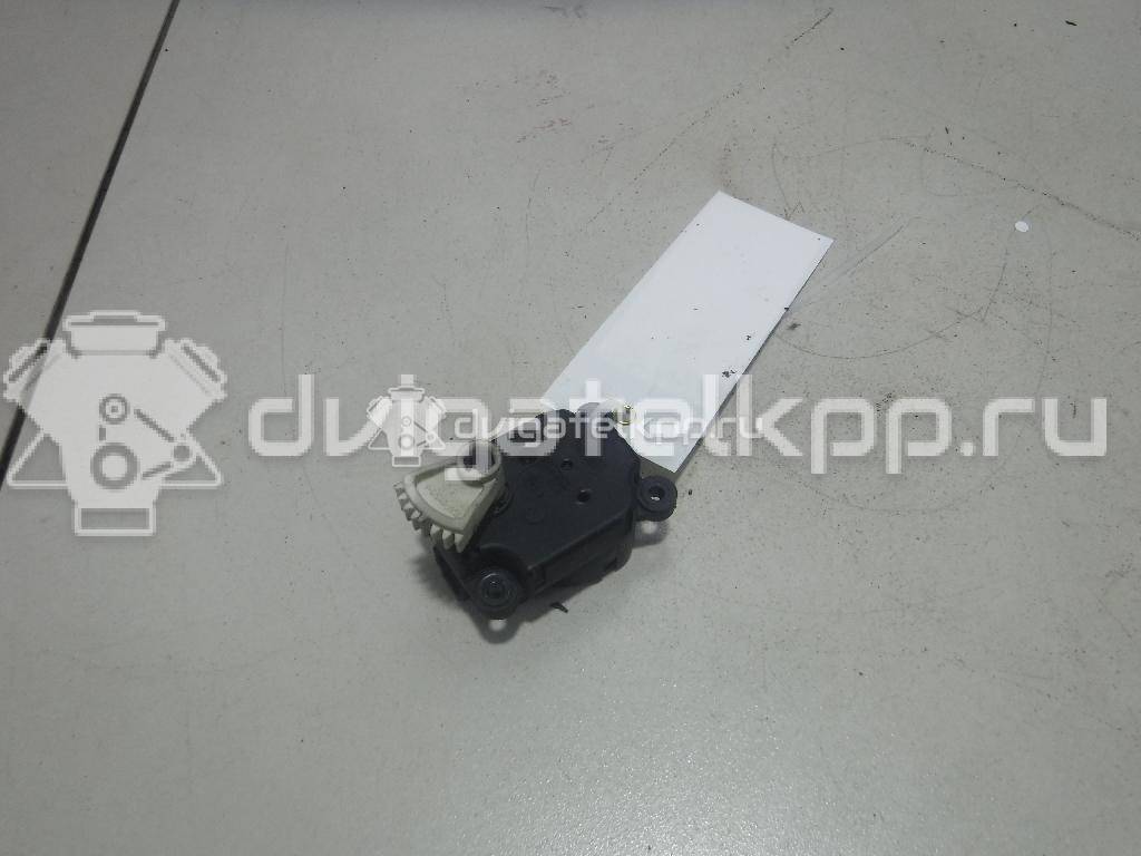 Фото Моторчик заслонки отопителя  1S7H19E616AA для Ford Focus / Mondeo {forloop.counter}}
