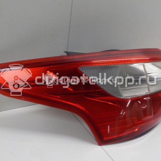 Фото Фонарь задний наружный левый  1863056 для Ford Focus