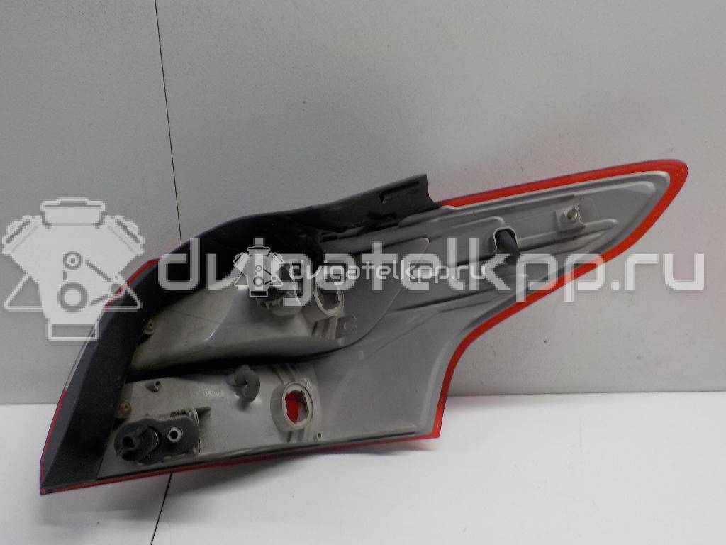 Фото Фонарь задний наружный левый  1863056 для Ford Focus {forloop.counter}}