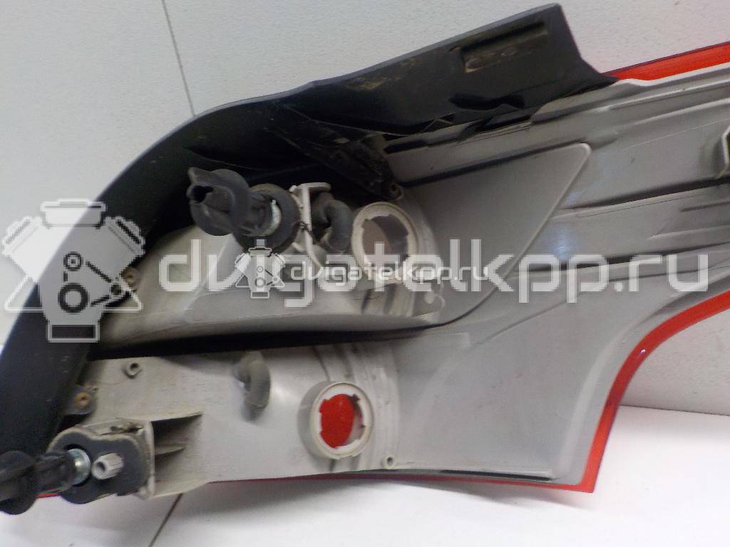 Фото Фонарь задний наружный левый  1863056 для Ford Focus {forloop.counter}}