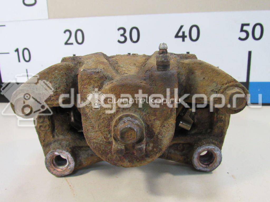 Фото Суппорт тормозной передний правый  410011KC2C для Nissan Juke F15 / Pulsar C13 {forloop.counter}}