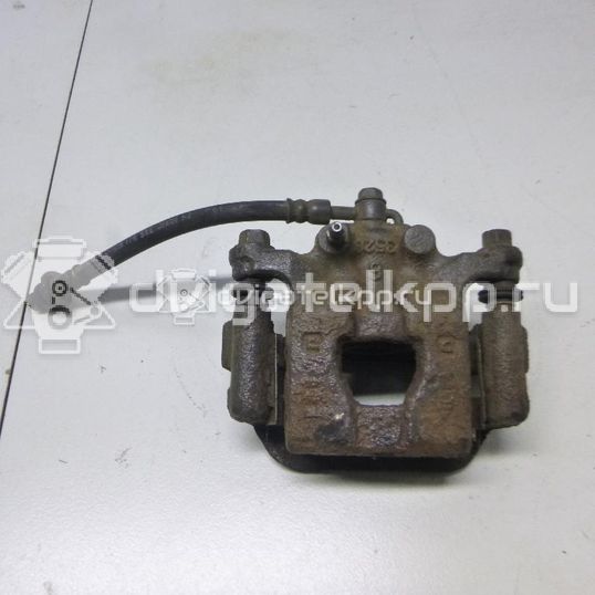 Фото Суппорт тормозной задний правый  440011KD0A для Nissan Tiida / Qashqai / Cube Z12 / Juke F15 / Pulsar C13
