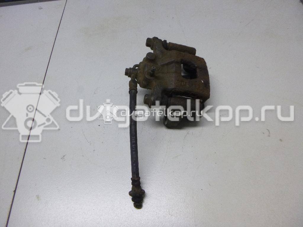 Фото Суппорт тормозной задний правый  440011KD0A для Nissan Tiida / Qashqai / Cube Z12 / Juke F15 / Pulsar C13 {forloop.counter}}