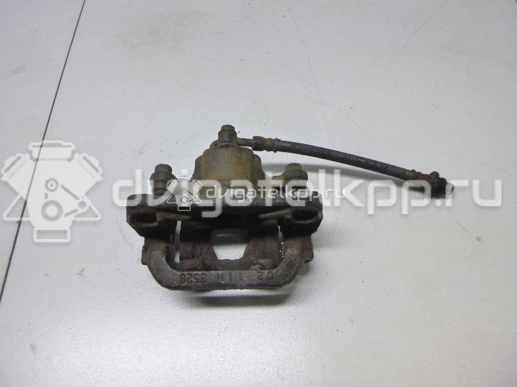 Фото Суппорт тормозной задний правый  440011KD0A для Nissan Tiida / Qashqai / Cube Z12 / Juke F15 / Pulsar C13 {forloop.counter}}