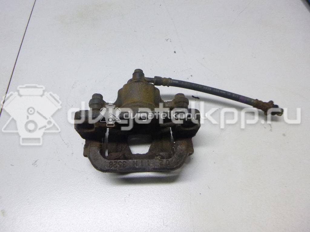 Фото Суппорт тормозной задний правый  440011KD0A для Nissan Tiida / Qashqai / Cube Z12 / Juke F15 / Pulsar C13 {forloop.counter}}
