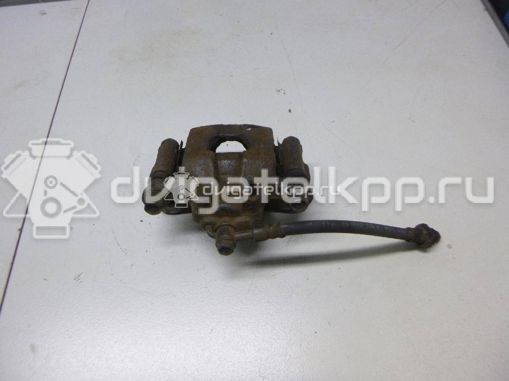 Фото Суппорт тормозной задний правый  440011KD0A для Nissan Tiida / Qashqai / Cube Z12 / Juke F15 / Pulsar C13 {forloop.counter}}