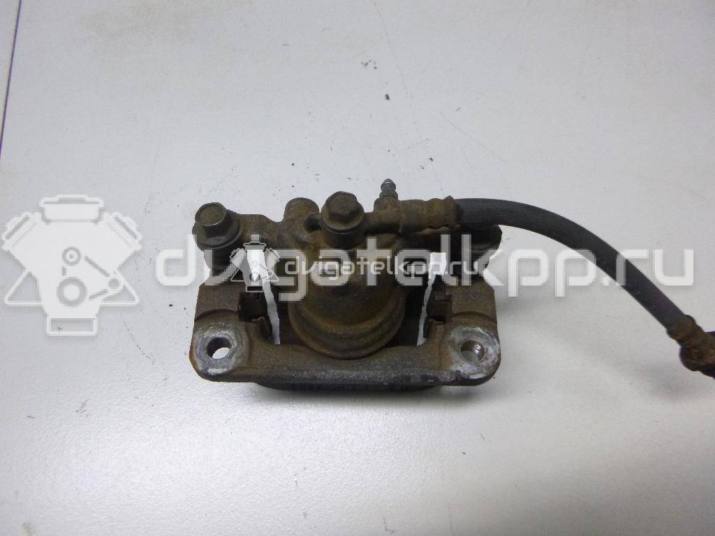 Фото Суппорт тормозной задний правый  440011KD0A для Nissan Tiida / Qashqai / Cube Z12 / Juke F15 / Pulsar C13 {forloop.counter}}