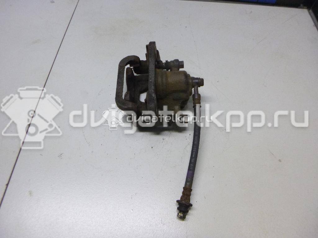 Фото Суппорт тормозной задний правый  440011KD0A для Nissan Tiida / Qashqai / Cube Z12 / Juke F15 / Pulsar C13 {forloop.counter}}
