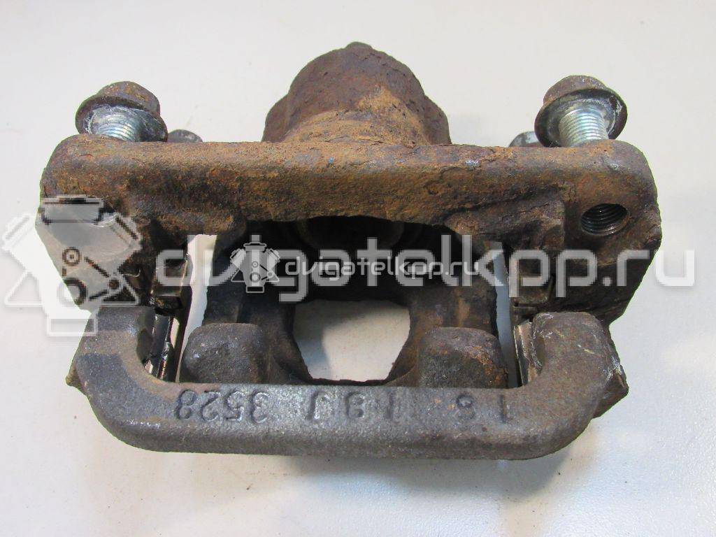 Фото Суппорт тормозной задний правый  440011KD0A для Nissan Tiida / Qashqai / Cube Z12 / Juke F15 / Pulsar C13 {forloop.counter}}