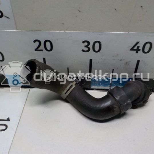 Фото Патрубок радиатора  1336522 для Opel Astra / Zafira