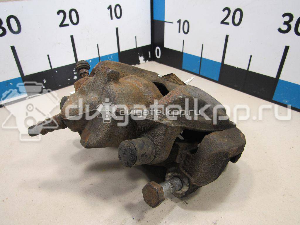 Фото Суппорт тормозной передний левый  410111495R для Renault Megane / Scénic / Grand / Captur J5 / Fluence L30 {forloop.counter}}