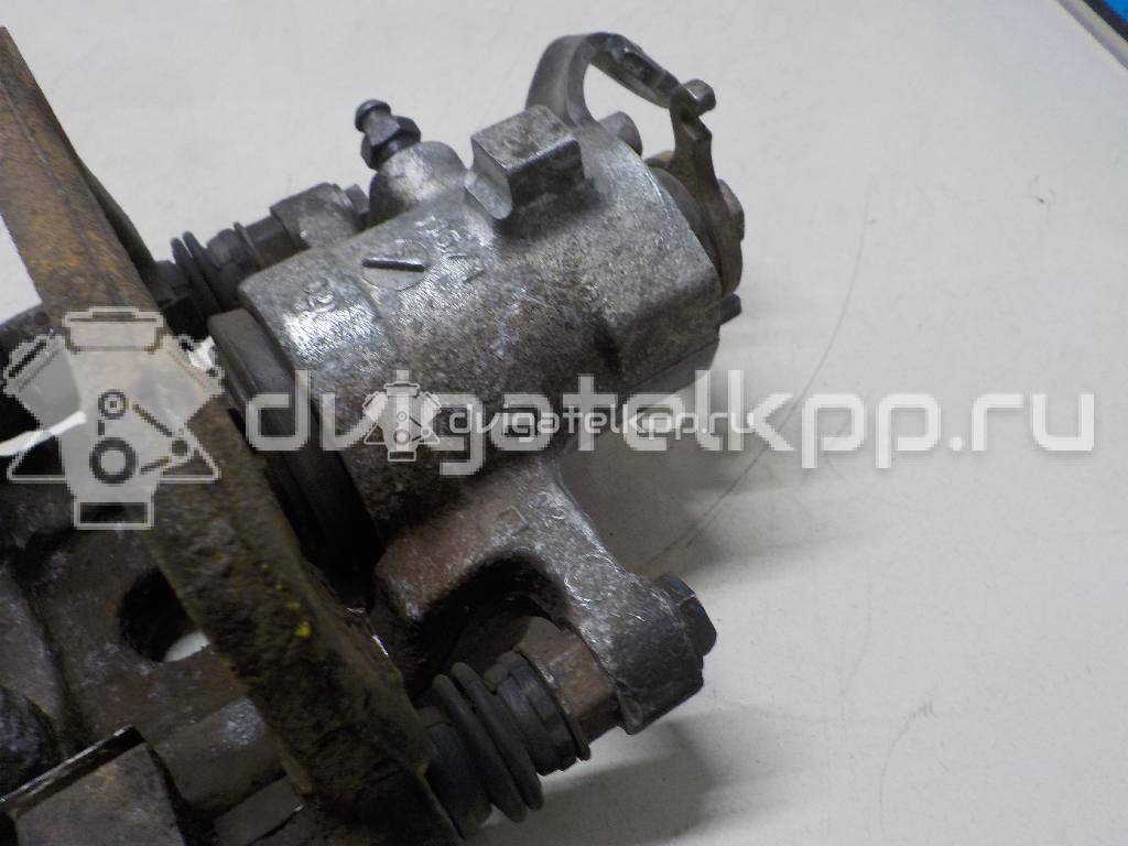 Фото Суппорт тормозной задний правый  7701206345 для Renault Modus Grand F Jp0 / Clio / Scénic / Megane {forloop.counter}}