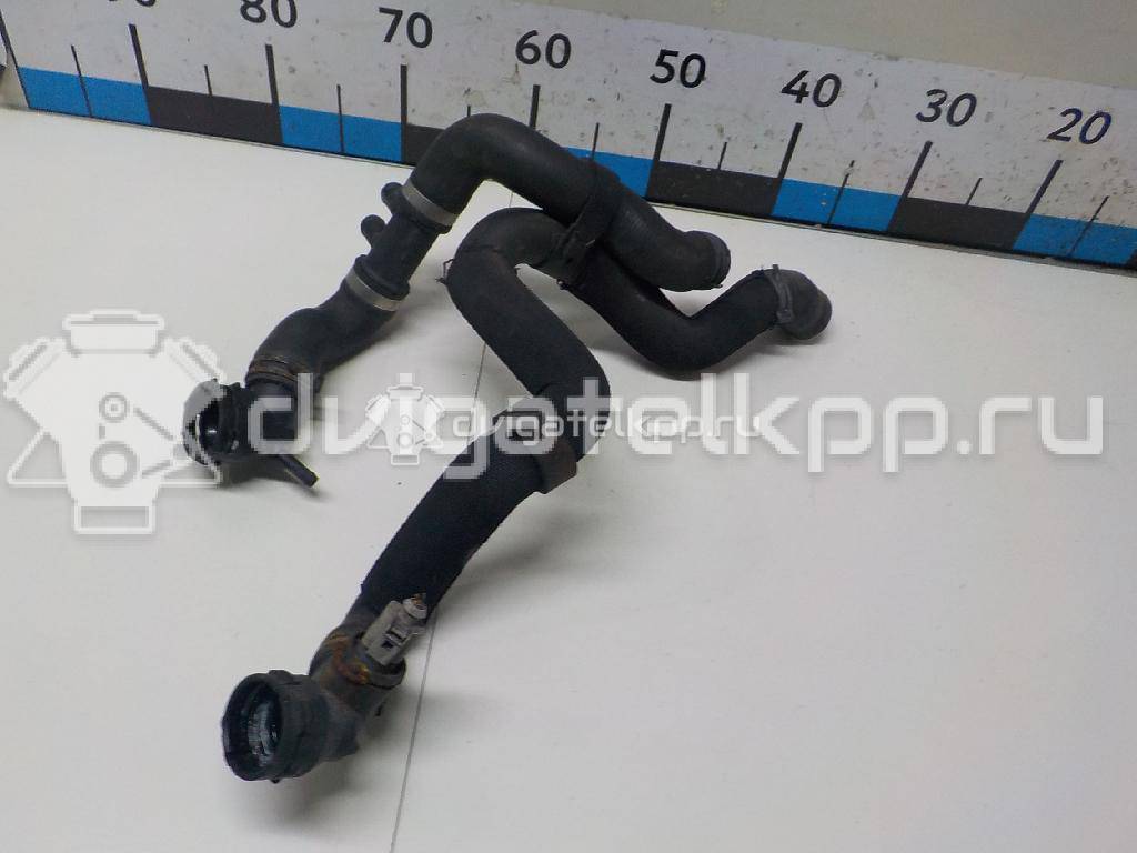 Фото Патрубок радиатора  1K0121156CE для Volkswagen Scirocco / Touran / Eos 1F7, 1F8 / Golf / Beetle {forloop.counter}}