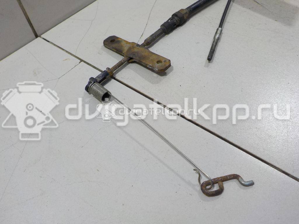 Фото Трос стояночного тормоза  7H0711476E для Volkswagen Transporter / Multivan {forloop.counter}}