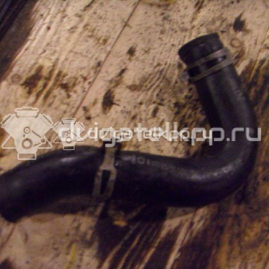 Фото Патрубок радиатора  357121051B для Volkswagen Passat / Jetta / Golf