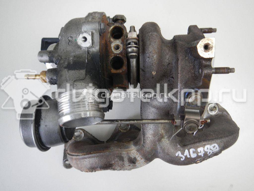 Фото Турбокомпрессор (турбина)  03C145703A для Volkswagen Scirocco / Tiguan / Touran / Cc / Sharan {forloop.counter}}