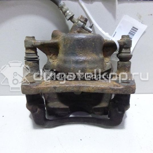 Фото Суппорт тормозной передний левый  4775005010 для Toyota Caldina / Carina / Camry / Picnic Xm1